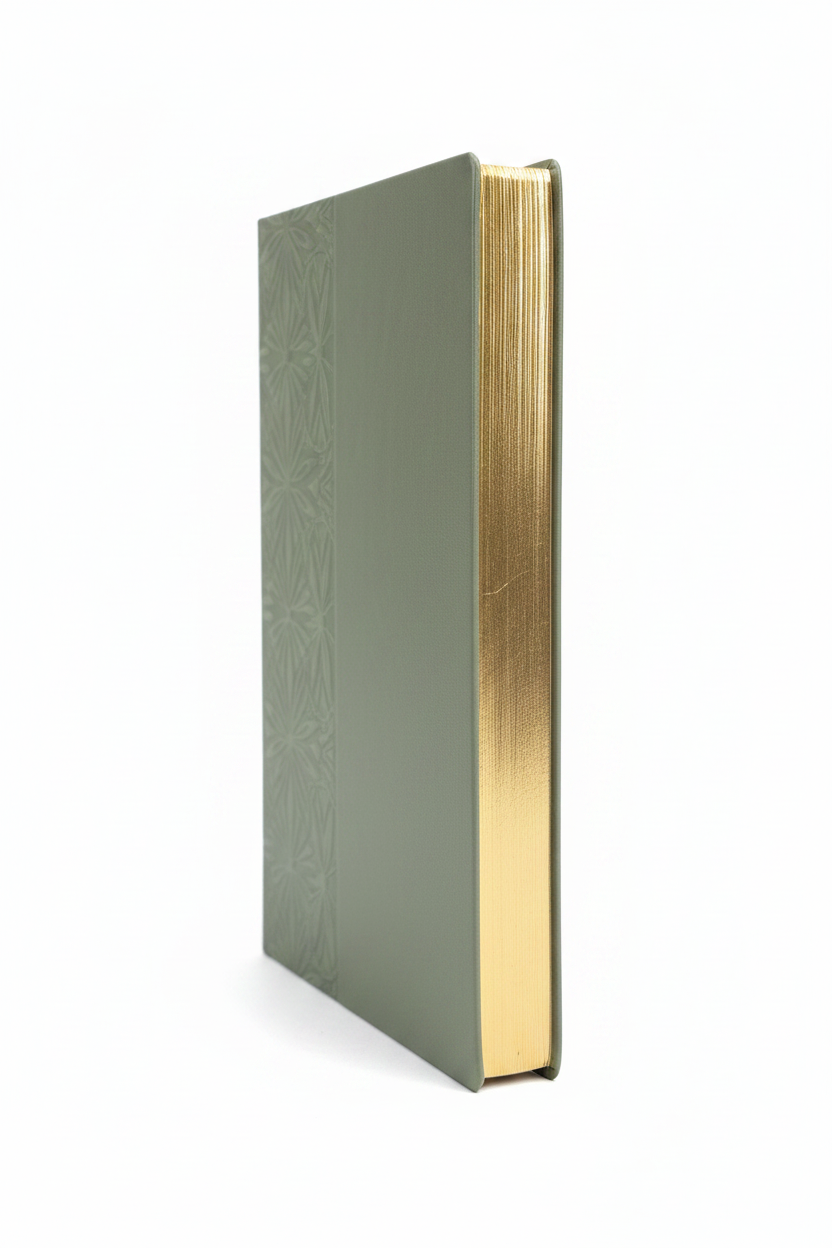 A5 sage faux leather journal with gilded gold edges highlighted