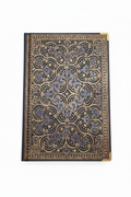 Large hardcover journal with gold filigree arabesque cover and brass corner guards