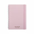Blush pink A5 spiral notebook with white coil binding and pink elastic band closure