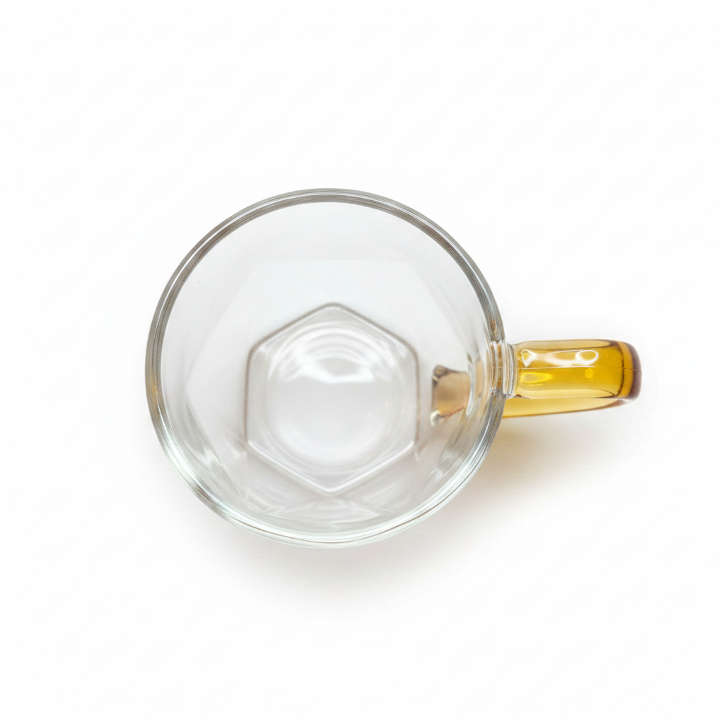Clear glass mug with gold handle top view